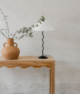 Scalloped console table